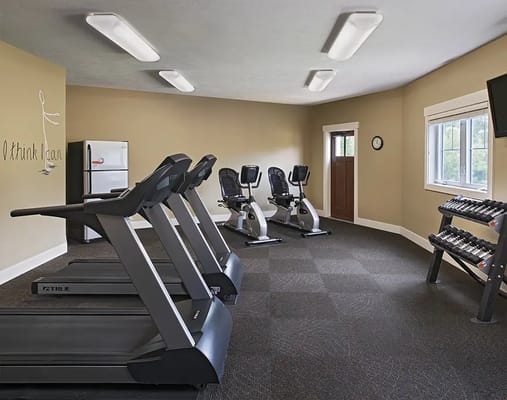 Interior view of a fitness room with exercise equipment