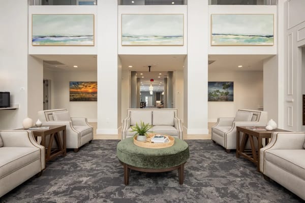 Bright and modern interior common area with seating