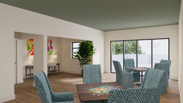 Bright common area with chairs and tables