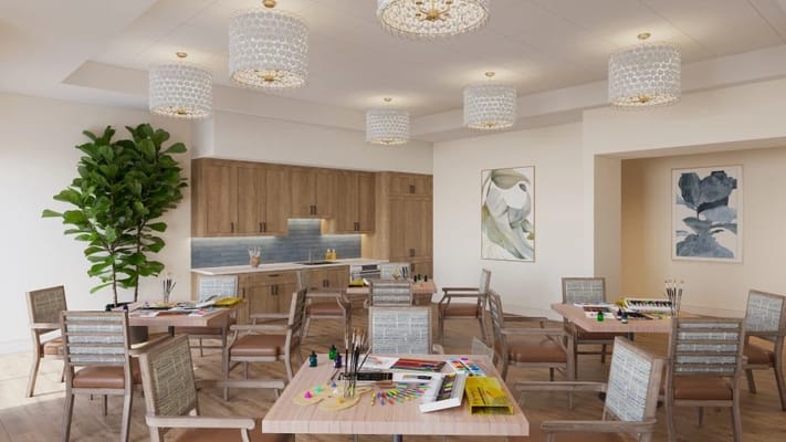 Bright activity room with art supplies and tables