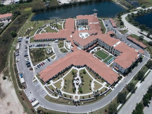 Aerial view of American House Coconut Point facility and grounds