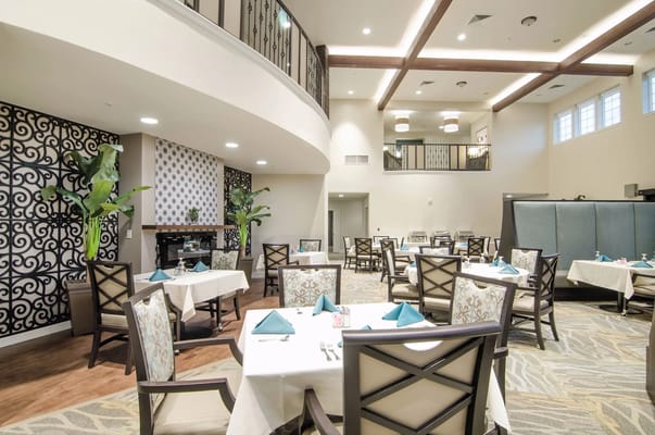 Elegant dining room setup with tables and decor