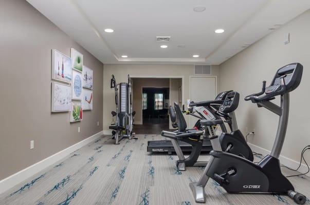 Interior fitness room with exercise equipment