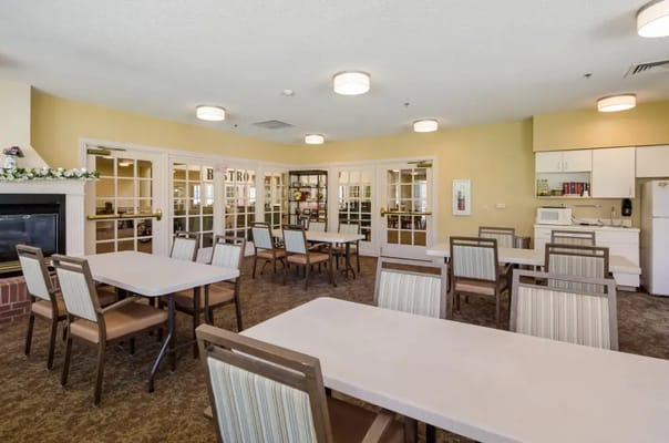 Interior view of a common area with tables and chairs