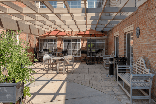 Outdoor seating area with umbrellas and tables