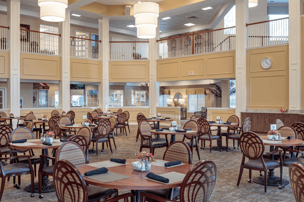 Bright dining area with neatly arranged tables and chairs
