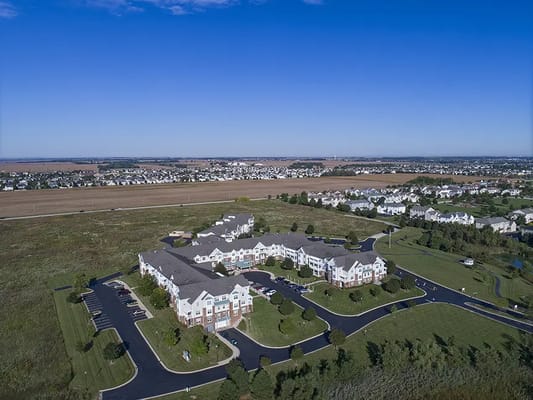 Aerial view of an assisted living facility with outdoor spaces