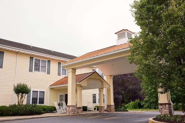 Exterior view of a senior living facility entrance