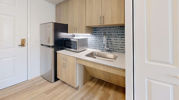 Modern facility kitchenette with appliances