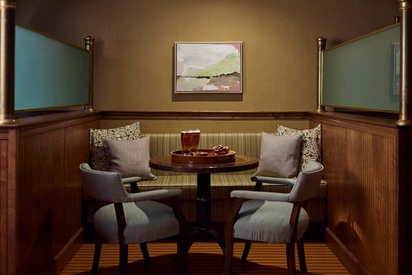 Cozy seating area in a common room with snacks and drinks