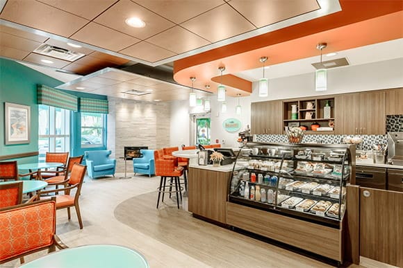 Bright and welcoming common area with seating and decor