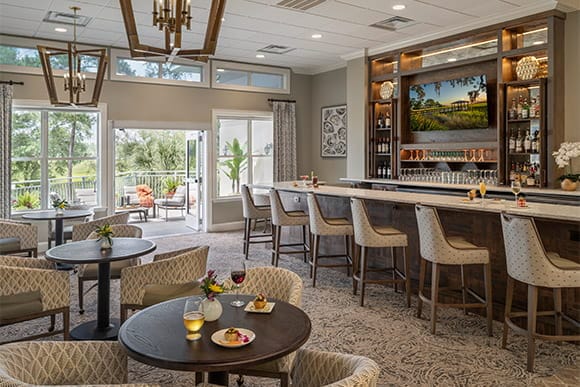 Elegant dining room with table settings and drinks