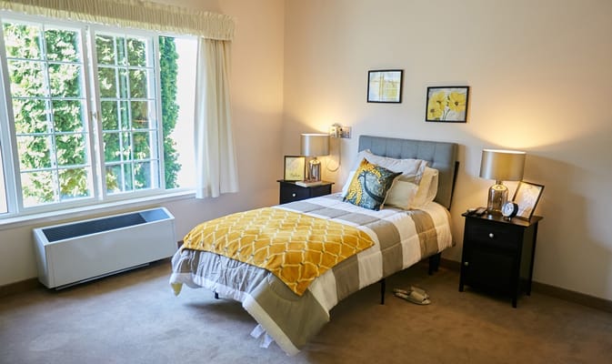 Cozy bedroom setup with natural light and decorative touches