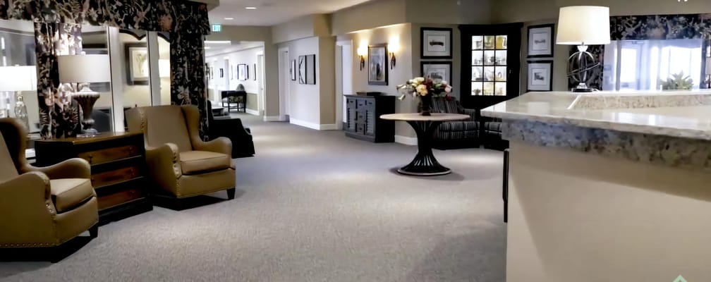 Spacious interior common area with seating and decor