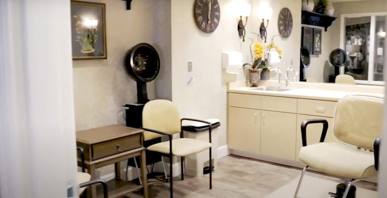 Bright interior of a beauty salon with chairs and decor