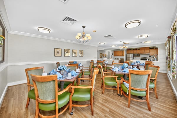 Bright dining room set for a meal with blue decor