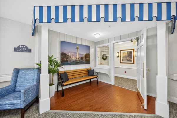 Bright lobby area with seating and artwork