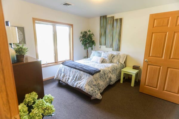Cozy private bedroom in an assisted living facility