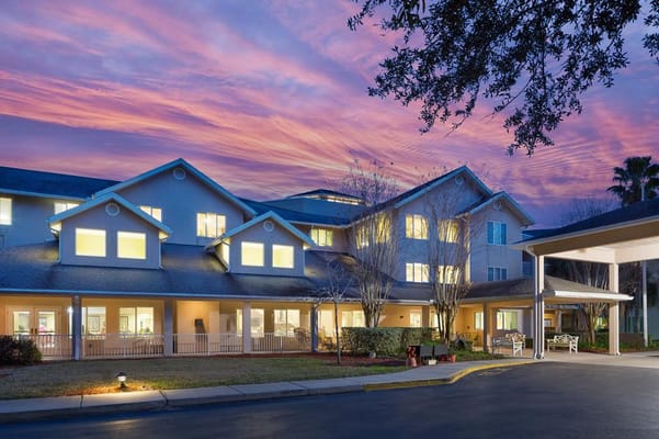 Exterior view of the facility at sunset