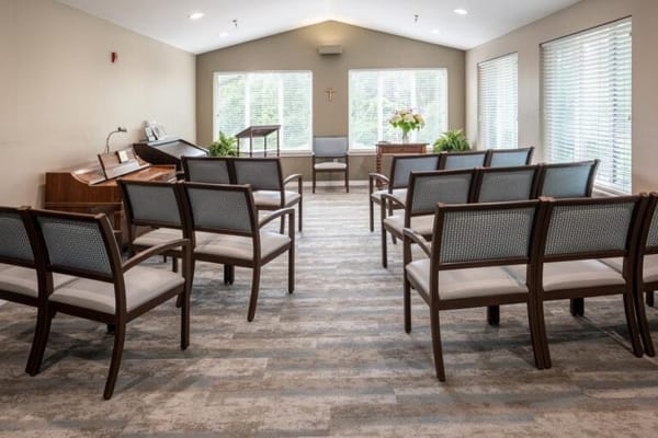An interior view of a serene room with seating