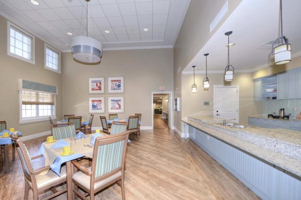 Dining room with tables set for breakfast