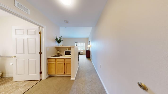 Hallway of a private resident room with kitchenette