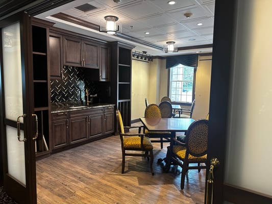 Interior view of a cozy common area with seating