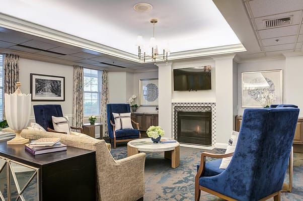 Common area with seating and fireplace in a cozy setting