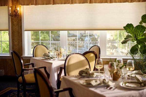 Elegant dining room setup with beautiful natural light