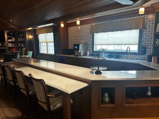 Modern kitchen area with seating