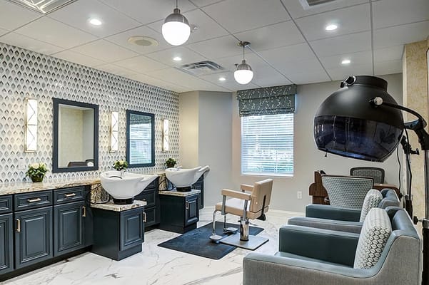 Interior view of a salon area with styling stations