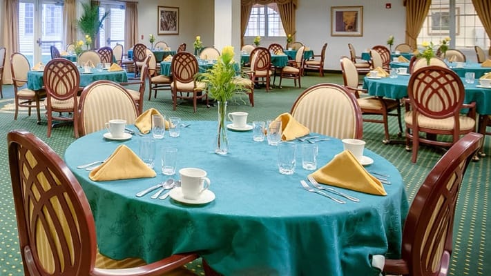 Dining area with neatly arranged tables and chairs