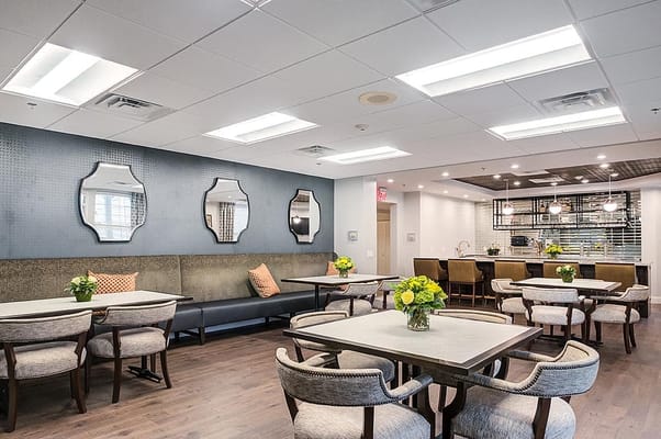 Bright dining area with chairs and tables