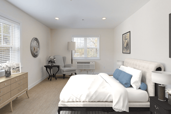 Brightly lit private resident room with modern furnishings