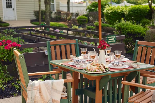 Outdoor dining setup with food and drinks