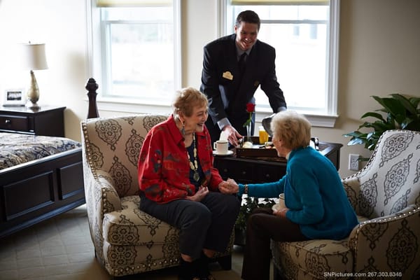 Residents enjoying conversation in a common area