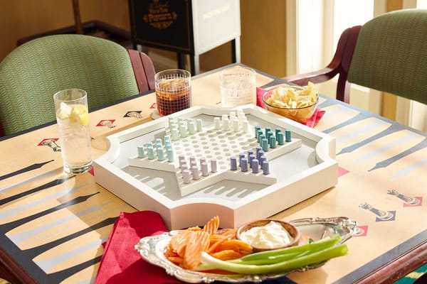 A table set with a game and snack platter