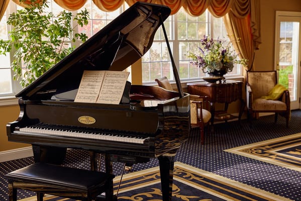Elegant piano in a cozy indoor lounge area