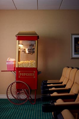 A vintage popcorn machine in a common area