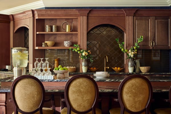 Elegant kitchen area with decorative elements and seating