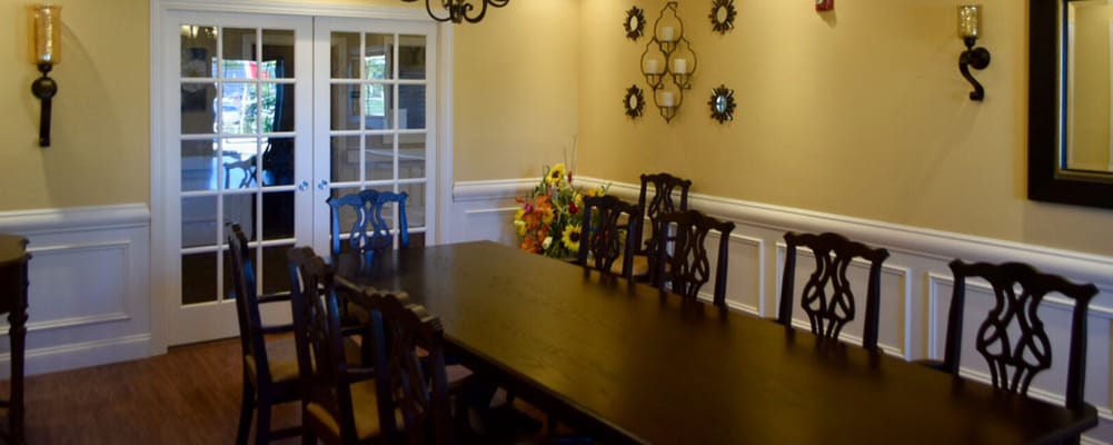 Interior view of a dining area with a long table