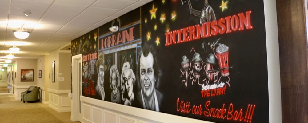 Colorful mural in a facility hallway