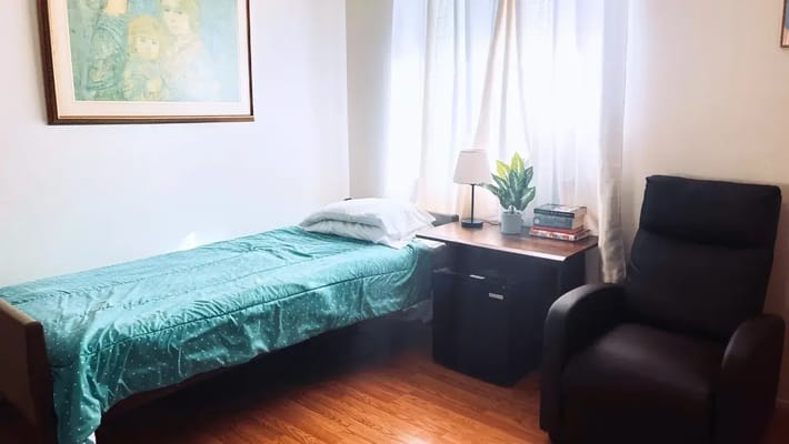 Cozy private resident room with warm lighting