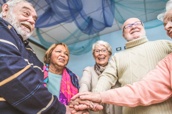 Residents participating in a group activity indoors