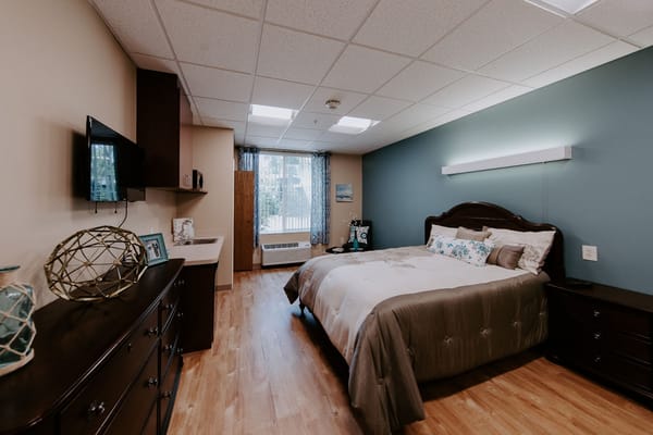 Cozy private bedroom in an assisted living facility