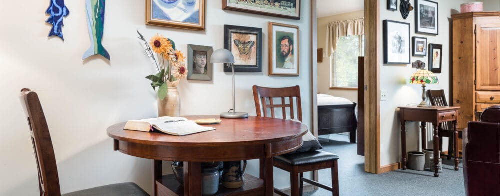 Cozy common area with artwork and a table