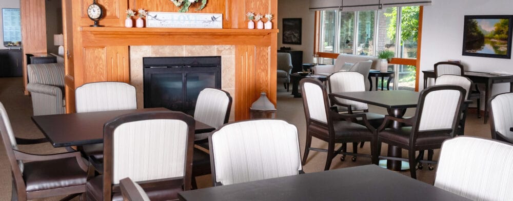 Interior view of a common dining area with tables and seating