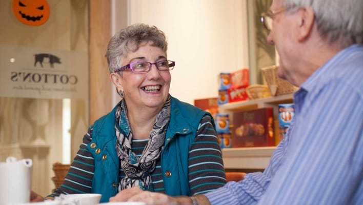 Residents enjoying a conversation in a common area