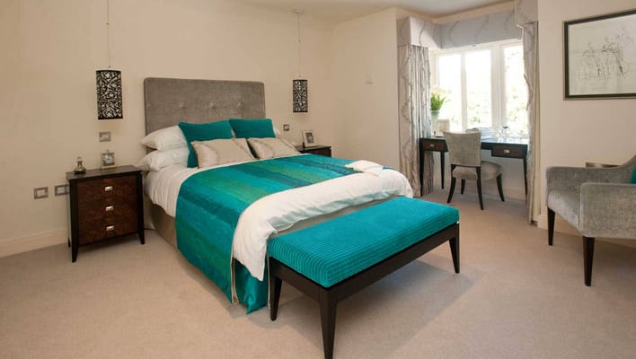A well-furnished bedroom in a retirement village