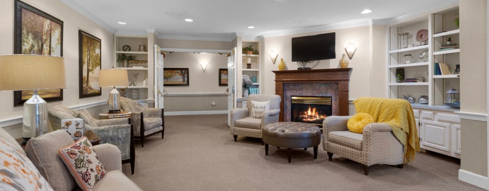 Cozy common area with comfortable seating and a fireplace